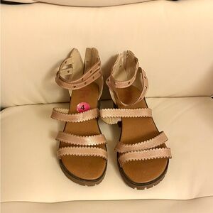 Jellypop sandals
for women feature a cork block